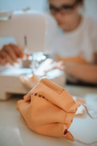 Woman sewing face mask for corona covid pandemic with sewing machine, Woman sewing face mask for corona covid pandemic with sewing machine,